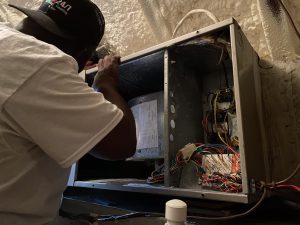 Charleston AC Repair Inspecting Particulate Build-Up and Electrical